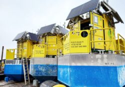Floating LIDAR buoys waiting to be checked before being launched to be towed to locations in the Celtic Sea Floating LIDAR buoys waiting to be checked before being launched to be towed to locations in the Celtic Sea